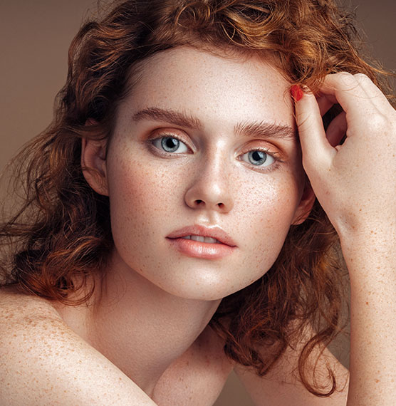 woman with glowing skin after microneedling St. Petersburg